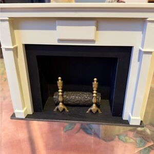 Elegant Cream and Black Fireplace Accent
